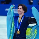 Mikhail Shaidorov celebrates winning men’s figure skating gold at the 2026 Winter Olympics