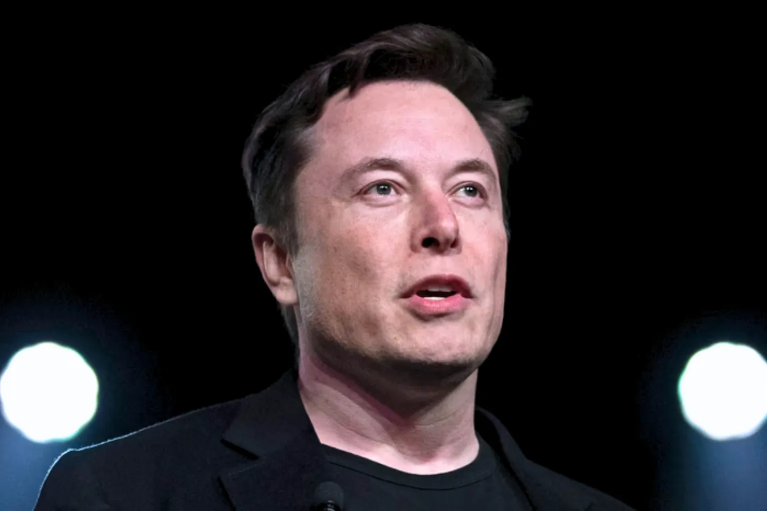 7 Tactics After Elon Musk Misled Investors to Save Money 1 Elon Musk speaking amid controversy over claims Elon Musk misled investors in tech and finance markets