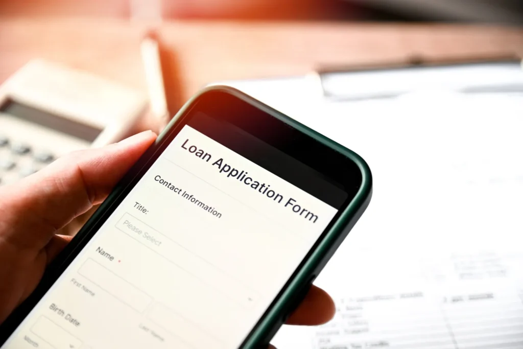 Federal Student Loan Changes: Treasury Takeover and Loan Application Impact Loan application on smartphone showing impact on Treasury take over federal student loans in the US